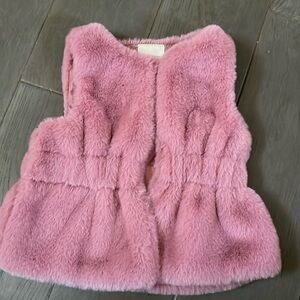 Gorgeous excellent condition fur vest. Button closure.